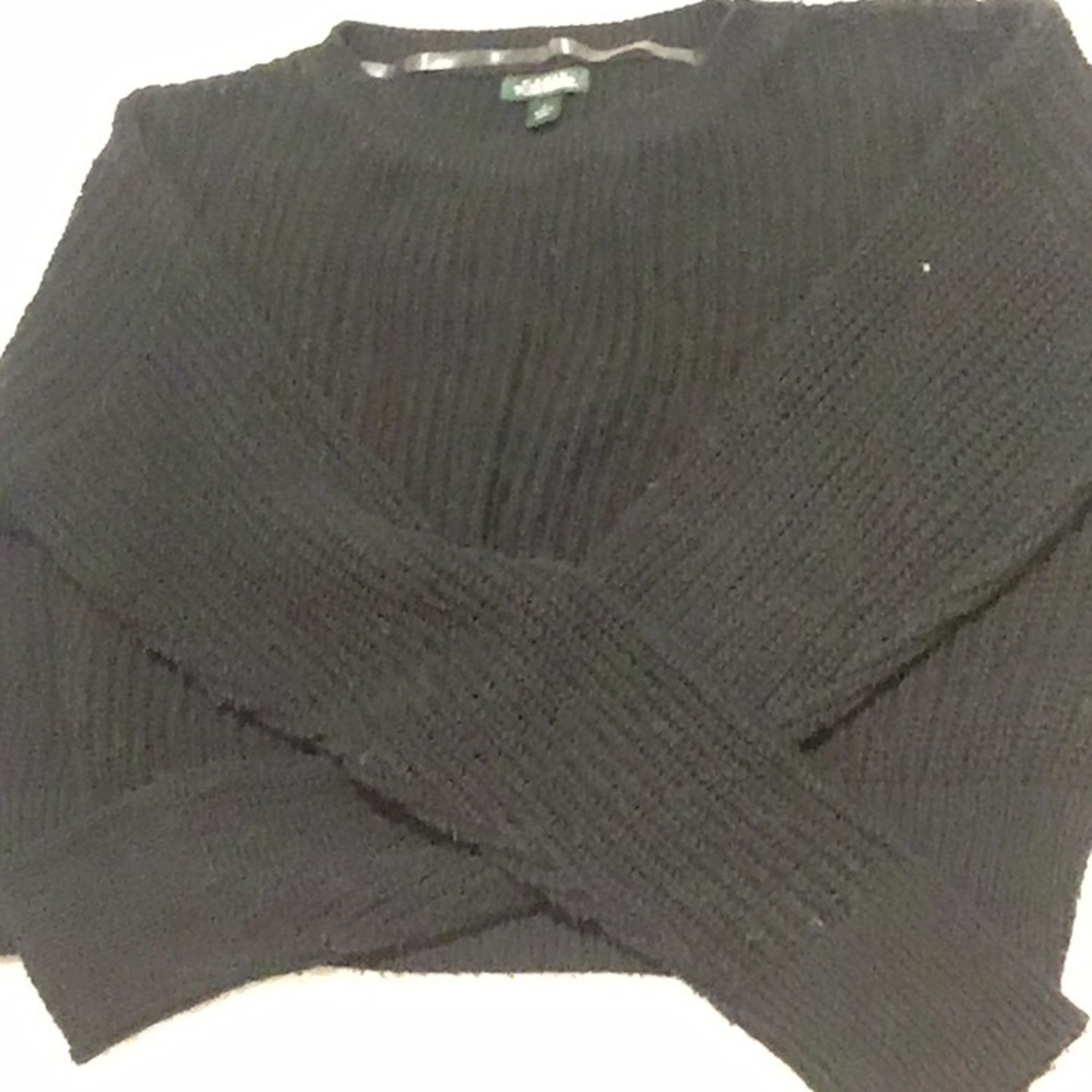 Woman’s black sweater
